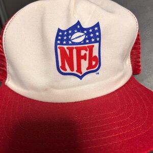 This is a vintage 80s NFL New Era red and white trucker snapback hat.